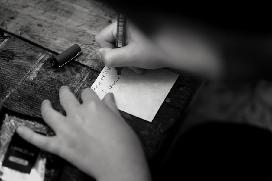 A hand writing a heartfelt letter